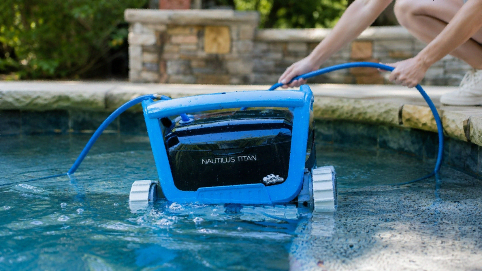 Dolphin Nautilus Titan 2026 robotic pool cleaner with Wi-Fi and waterline scrubbing